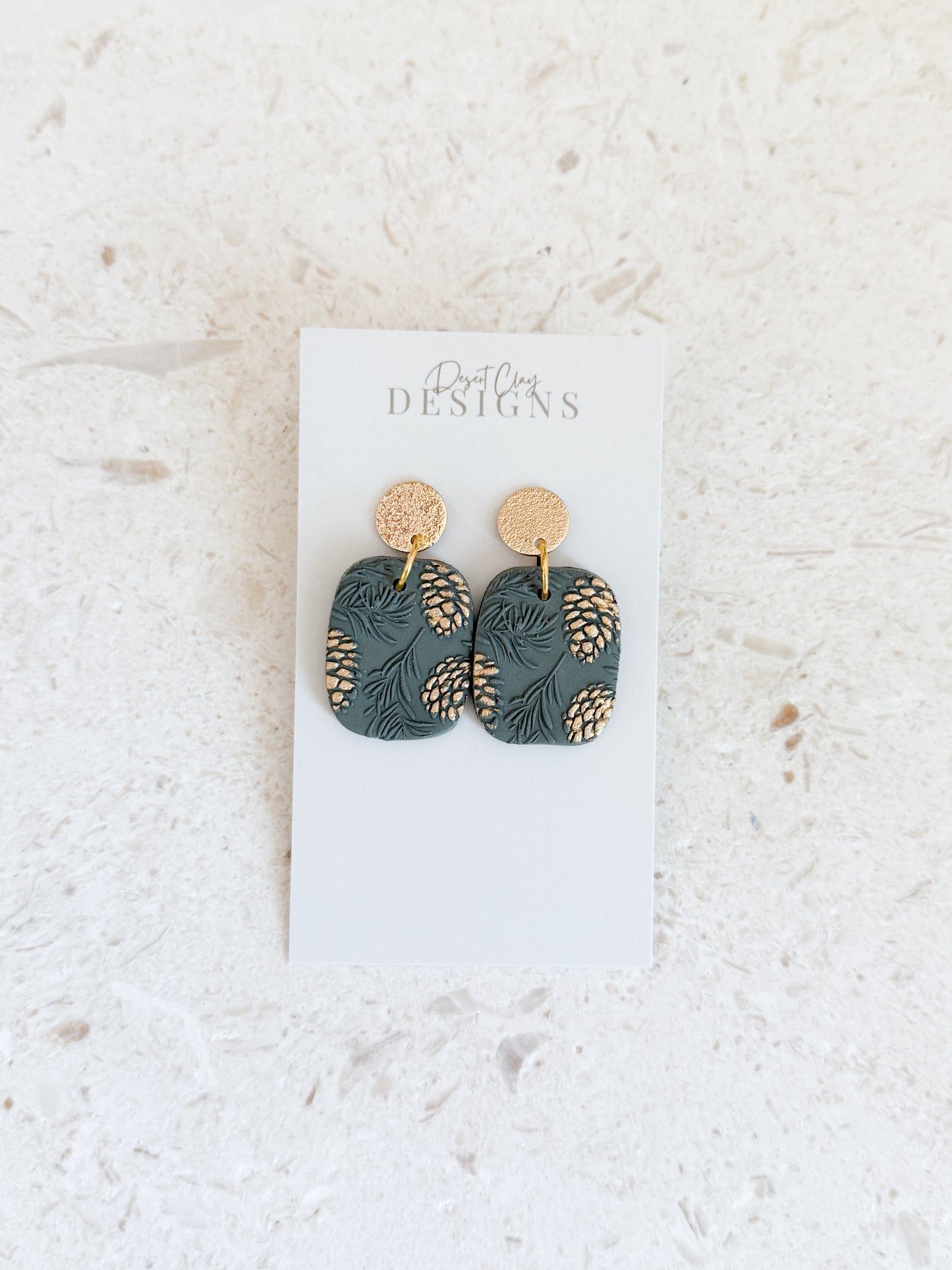 Emery - Evergreen Pinecones