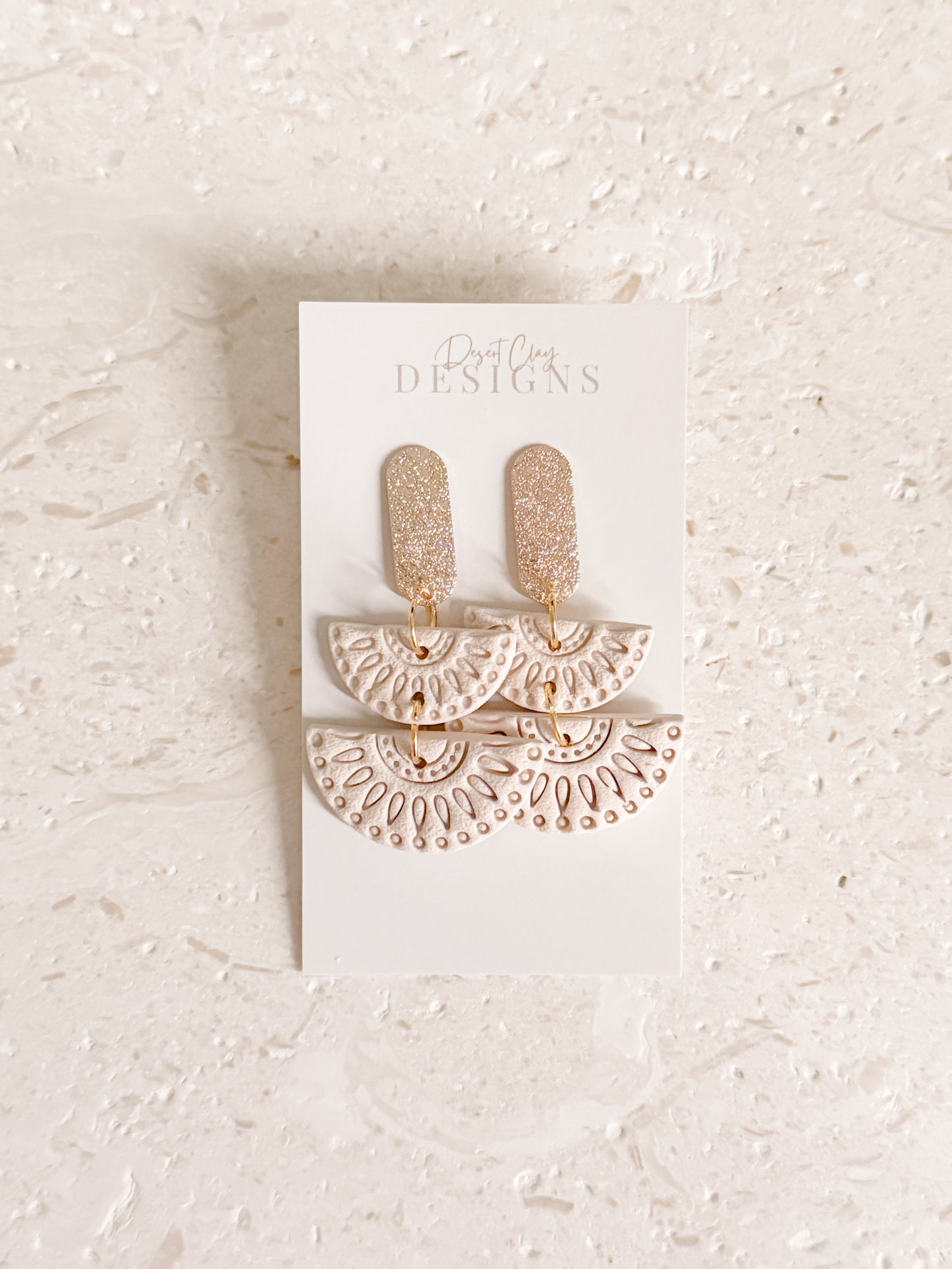 Cleo Dangles