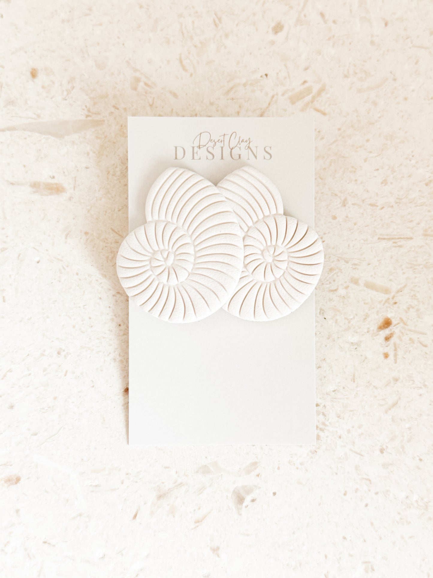 Oversized Ribbed Shell Studs